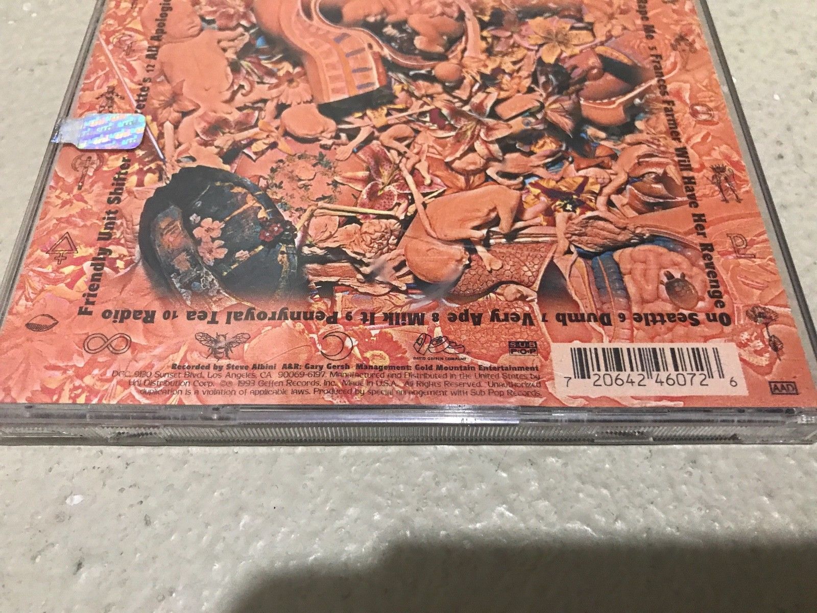 Help with identifying this In Utero CD? Is the heart hole punch anything  significant? : r/Nirvana